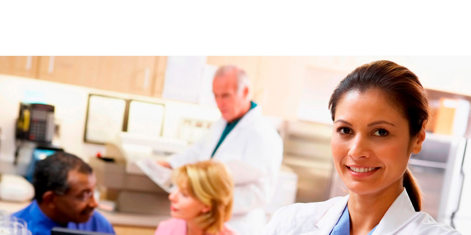 A group of doctors and nurses in the hospital.